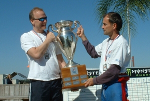 Dr. Joel Shugar presents the Shugar Cup to NSL founder Kurt Gaebel
